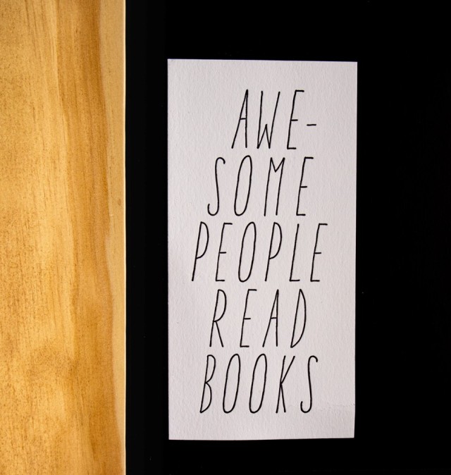 Image of sign that says awesome people read books
